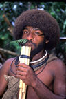 Huli man with "worry flute"